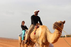 Exploring the Omani Desert by camel