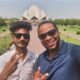 Posing with a random stranger in front of the Lotus temple